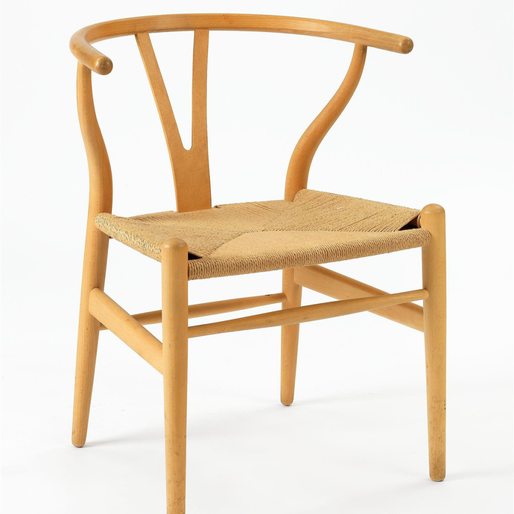 Wishbone dining chair in natural beech with a woven paper-cord seat